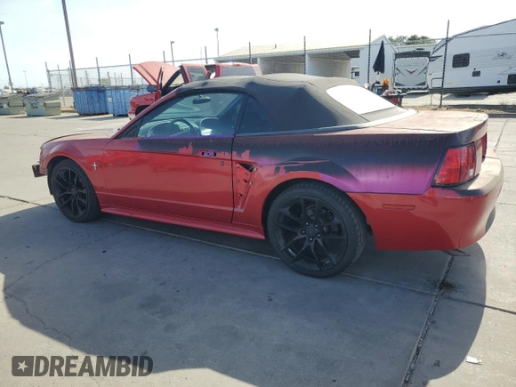 2002 Ford Mustang Deluxe with VIN 1FAFP44462F174929, listed as a Copart auction lot 61975925 with 110,825 mi miles and Salvage title. Bid and sale history available at DreamBid. Image 2.