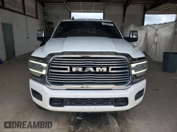 2023 Ram 2500 Laramie with VIN 3C6UR5FL2PG632162, listed as a Copart auction lot 56220575 with 59,902 mi miles and Salvage title. Bid and sale history available at DreamBid. Image 5.