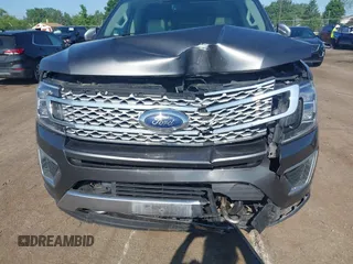 2021 Ford Expedition Max Platinum with VIN 1FMJK1MT8MEA66311, listed as a IAAI auction lot 42450429 with 95,732 mi miles and . Bid and sale history available at DreamBid. Image 6.