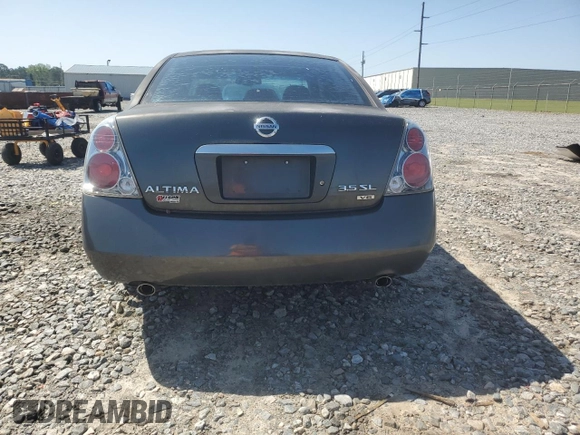 2005 Nissan Altima SE z VIN 1N4BL11D85C209229, wystawiony jako Copart lot #52391285 z przebiegiem 164 231 mil mil oraz Szkoda całkowita • Salvage title. Historia ofert i sprzedaży dostępna na DreamBid. Obrazek 6.