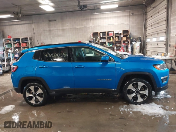 2020 Jeep Compass Latitude with VIN 3C4NJDBBXLT104849, listed as a IAAI auction lot 41606035 with 116,706 mi miles. Bid and sale history available at carsss.com. Image 13.