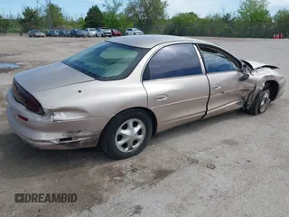 1999 Oldsmobile Aurora z VIN 1G3GR62C5X4114285, wystawiony jako IAAI lot #42271517 z przebiegiem 308 731 mil mil oraz . Historia ofert i sprzedaży dostępna na DreamBid. Obrazek 4.
