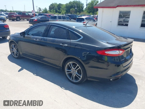 2014 Ford Fusion Titanium with VIN 3FA6P0K9XER216551, listed as a IAAI auction lot 42037004 with 113,857 mi miles and . Bid and sale history available at DreamBid. Image 3.
