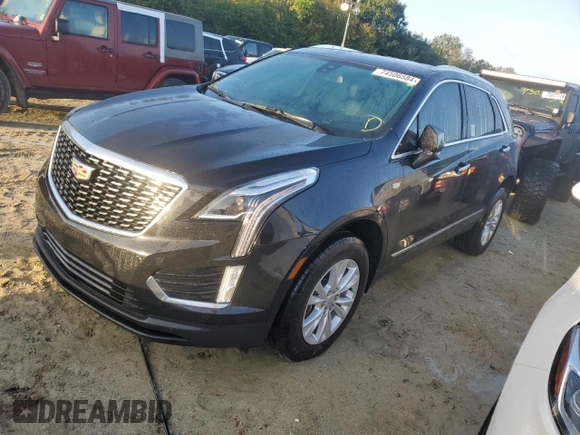 2022 Cadillac XT5 FWD Luxury z VIN 1GYKNAR49NZ159814, wystawiony jako Copart lot #74506584 z przebiegiem 7 069 mil mil oraz Nie do naprawy • Non repairable. Historia ofert i sprzedaży dostępna na DreamBid. Obrazek 1.