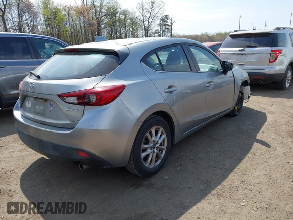 2014 Mazda 3 i Touring with VIN JM1BM1L70E1185972, listed as a IAAI auction lot 42005779 with 90,175 mi miles and . Bid and sale history available at DreamBid. Image 4.