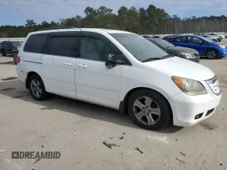 2010 Honda Odyssey Touring with VIN 5FNRL3H94AB097662, listed as a Copart auction lot 85587884 with 0 mi miles and Clean Title. Bid and sale history available at carsss.com. Image 4.