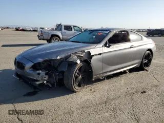 2012 BMW 6 Series 650i z VIN WBALX3C57CC528782, wystawiony jako Copart lot #53036125 z przebiegiem Nie podano mil oraz Szkody całkowita. Historia ofert i sprzedaży dostępna na DreamBid. Obrazek 1.