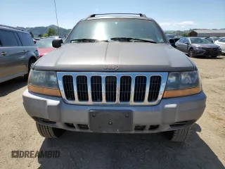 2000 Jeep Grand Cherokee Laredo with VIN 1J4G248S6YC333068, listed as a Copart auction lot 54972765 with 183,775 mi miles and Clean title. Bid and sale history available at DreamBid. Image 5.