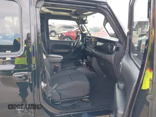 2021 Jeep Wrangler Unlimited Sport S with VIN 1C4HJXDN0MW817146, listed as a IAAI auction lot 41459993 with 20,367 mi miles and . Bid and sale history available at DreamBid. Image 5.