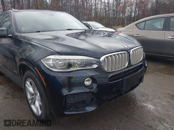 2014 BMW X5 xDrive50i with VIN 5UXKR6C59E0C03597, listed as a IAAI auction lot 41866944 with 65,890 mi miles. Bid and sale history available at carsss.com. Image 6.