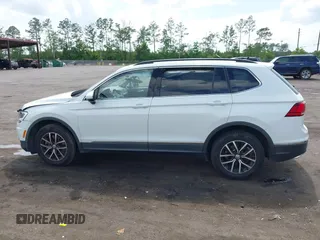 2021 Volkswagen Tiguan SE z VIN 3VV2B7AX5MM057743, wystawiony jako IAAI lot #42471192 z przebiegiem 80 133 mil mil oraz . Historia ofert i sprzedaży dostępna na DreamBid. Obrazek 14.