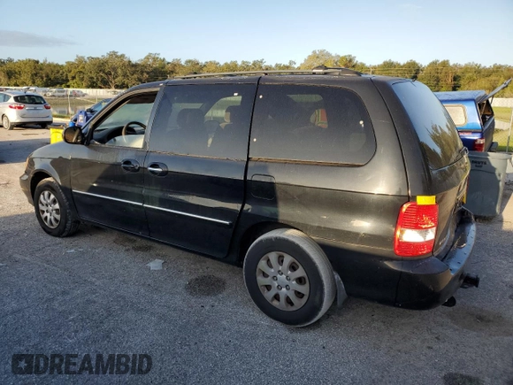 2005 Kia Sedona LX with VIN KNDUP131056640057, listed as a Copart auction lot 72153844 with 192,136 mi miles and Salvage Title. Bid and sale history available at carsss.com. Image 2.