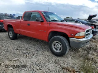 1999 Dodge Dakota SLT with VIN 1B7GG22X7XS101535, listed as a Copart auction lot 71592334 with 151,644 mi miles and Salvage Title. Bid and sale history available at DreamBid. Image 4.