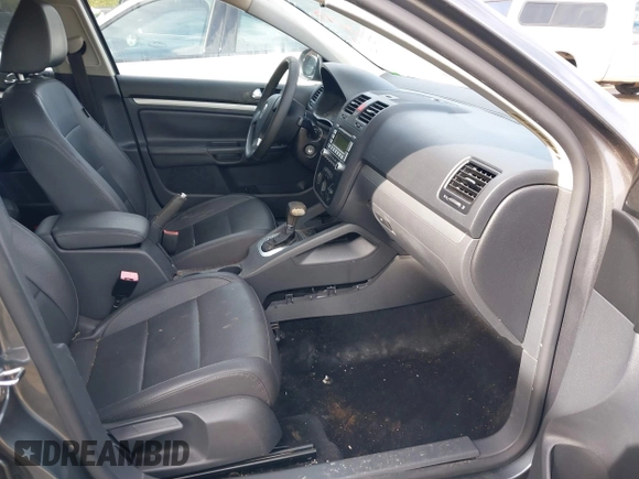 2009 Volkswagen Jetta Wolfsburg Edition with VIN 3VWRJ71K99M023071, listed as a IAAI auction lot 41853293 with 121,311 mi miles and . Bid and sale history available at DreamBid. Image 5.