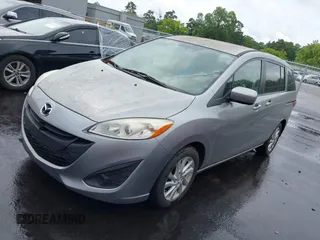 2012 Mazda 5 Sport z VIN JM1CW2BL6C0105662, wystawiony jako IAAI lot #42465711 z przebiegiem 67 534 mil mil oraz . Historia ofert i sprzedaży dostępna na DreamBid. Obrazek 2.
