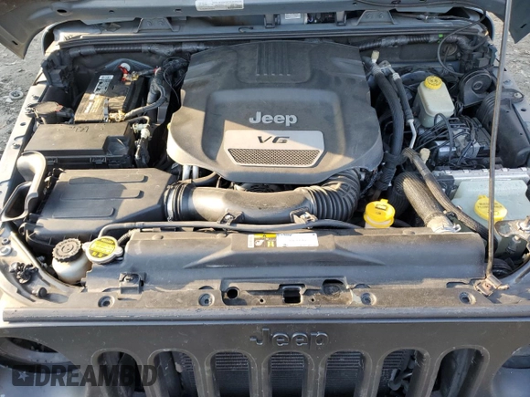 2015 Jeep Wrangler Unlimited Rubicon Hard Rock with VIN 1C4HJWFGXFL671660, listed as a Copart auction lot 82329074 with 214,579 mi miles and Salvage title. Bid and sale history available at DreamBid. Image 12.