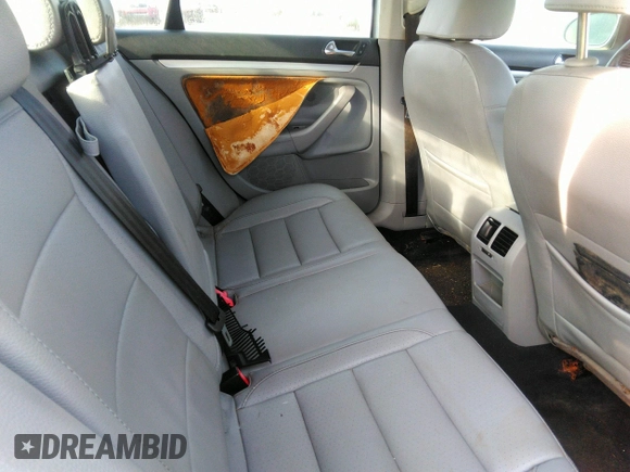 2009 Volkswagen Jetta Wolfsburg Edition with VIN 3VWRJ71K19M013277, listed as a IAAI auction lot 34707512 with 129,034 mi miles and . Bid and sale history available at DreamBid. Image 8.