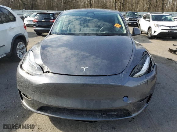 2023 Tesla Model Y Long Range with VIN 7SAYGDEE6PF841748, listed as a Copart auction lot 43748195 with 22,563 mi miles and Salvage Title. Bid and sale history available at carsss.com. Image 5.