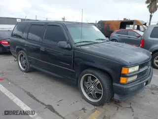 2000 Chevrolet Tahoe Limited with VIN 1GNEC13R7YR151624, listed as a IAAI auction lot 41785878 with 227,576 mi miles. Bid and sale history available at carsss.com. Image 1.