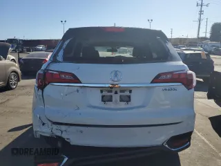 2018 Acura RDX w/Advance Pkg with VIN 5J8TB3H71JL012623, listed as a Copart auction lot 88931615 with 106,632 mi miles and Salvage Title. Bid and sale history available at carsss.com. Image 6.