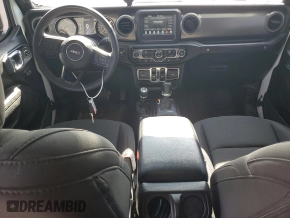 2023 Jeep Gladiator Sport S with VIN 1C6HJTAG4PL556387, listed as a Copart auction lot 47453305 with 35,611 mi miles and Salvage title. Bid and sale history available at DreamBid. Image 8.