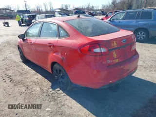 2012 Ford Fiesta SE with VIN 3FADP4BJ3CM155725, listed as a IAAI auction lot 41795297 with 128,517 mi miles. Bid and sale history available at carsss.com. Image 3.