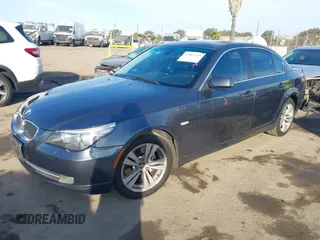 2009 BMW 5 Series 528i with VIN WBANU53519C118596, listed as a IAAI auction lot 41482725 with 130,975 mi miles and . Bid and sale history available at carsss.com. Image 2.