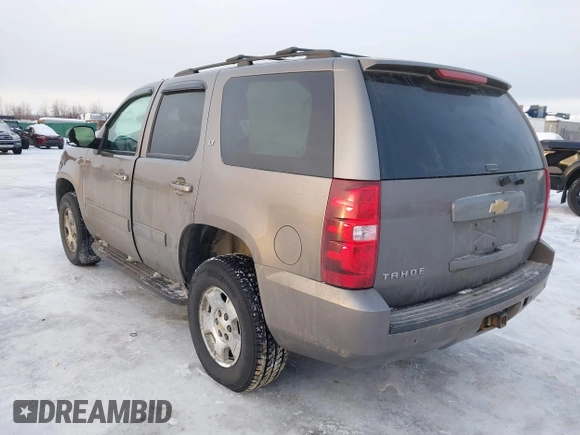 2013 Chevrolet Tahoe LT with VIN 1GNSKBE0XDR296094, listed as a IAAI auction lot 41448160 with 167,165 mi miles and . Bid and sale history available at DreamBid. Image 3.