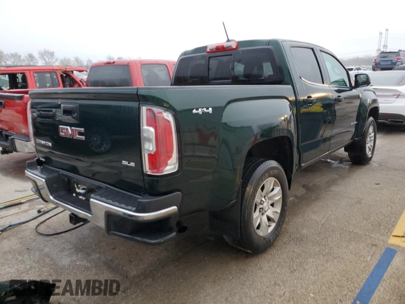 2016 GMC Canyon 4WD SLT with VIN 1GTG6CE39G1107246, listed as a Copart auction lot 82300084 with 122,531 mi miles and Salvage Title. Bid and sale history available at carsss.com. Image 3.
