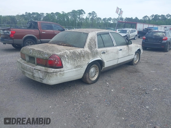 2001 Mercury Grand Marquis LS with VIN 2MEFM75WX1X633210, listed as a IAAI auction lot 42092135 with 161,963 mi miles and . Bid and sale history available at DreamBid. Image 4.