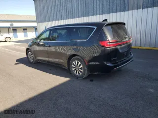 2023 Chrysler Pacifica Hybrid Touring L with VIN 2C4RC1L7XPR592181, listed as a Copart auction lot 52144505 with 45,770 mi miles and Salvage Title. Bid and sale history available at carsss.com. Image 2.