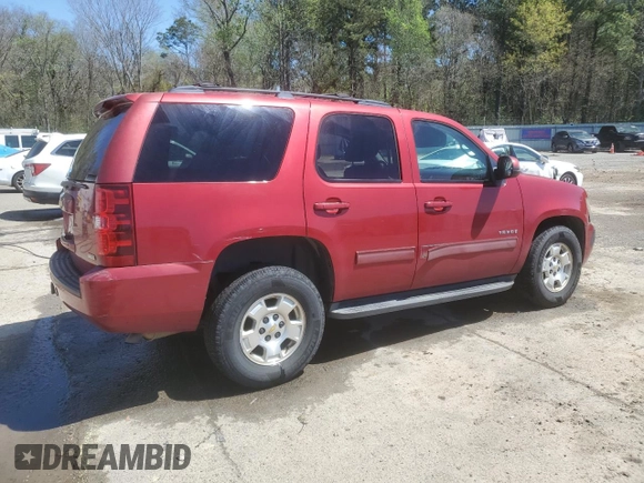 2012 Chevrolet Tahoe LS with VIN 1GNSCAE02CR319700, listed as a Copart auction lot 50321735 with 180,403 mi miles and Salvage title. Bid and sale history available at DreamBid. Image 3.