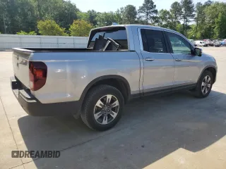 2019 Honda Ridgeline RTL-T with VIN 5FPYK3F67KB031672, listed as a Copart auction lot 55080205 with 106,912 mi miles and Salvage title. Bid and sale history available at DreamBid. Image 3.