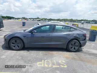 2023 Tesla Model 3 z VIN 5YJ3E1EA3PF435158, wystawiony jako IAAI lot #42356031 z przebiegiem 41 408 mil mil oraz . Historia ofert i sprzedaży dostępna na DreamBid. Obrazek 14.