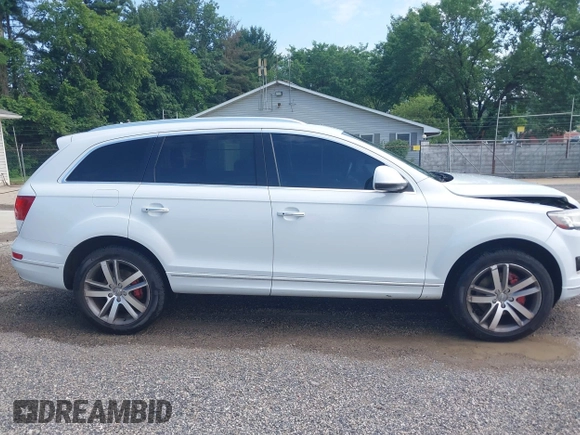 2014 Audi Q7 Premium Plus with VIN WA1LGAFE6ED015856, listed as a IAAI auction lot 42612500 with 96,946 mi miles and . Bid and sale history available at DreamBid. Image 13.