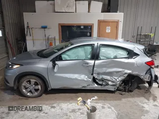 2021 Honda HR-V LX with VIN 3CZRU6H3XMM708864, listed as a IAAI auction lot 42170422 with 42,899 mi miles and . Bid and sale history available at DreamBid. Image 14.