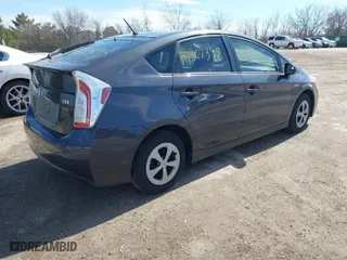 2013 Toyota Prius One with VIN JTDKN3DU2D5675947, listed as a IAAI auction lot 41807398 with 230,714 mi miles. Bid and sale history available at carsss.com. Image 4.