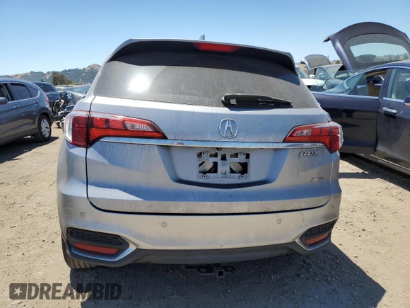 2018 Acura RDX Advance with VIN 5J8TB4H74JL001735, listed as a Copart auction lot 64629135 with 87,235 mi miles and Salvage title. Bid and sale history available at DreamBid. Image 6.