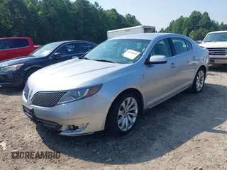 2013 Lincoln MKS with VIN 1LNHL9DK3DG614933, listed as a IAAI auction lot 42549445 with 313,182 mi miles and . Bid and sale history available at DreamBid. Image 2.