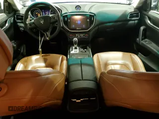 2015 Maserati Ghibli z VIN ZAM57XSA9F1139087, wystawiony jako Copart lot #52235355 z przebiegiem 68 788 mil mil oraz Szkoda całkowita • Salvage title. Historia ofert i sprzedaży dostępna na DreamBid. Obrazek 8.