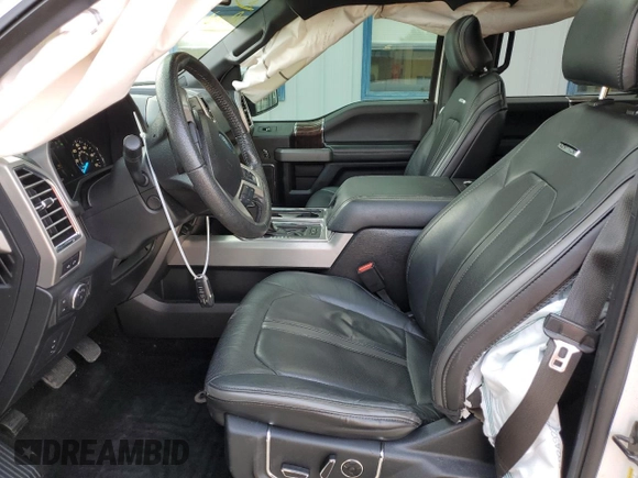 2015 Ford F-150 XLT with VIN 1FTEW1EG8FFC20685, listed as a Copart auction lot 60449545 with 117,935 mi miles and Salvage title. Bid and sale history available at DreamBid. Image 7.