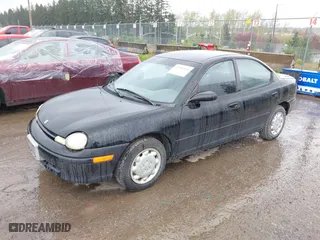 1997 Dodge Neon with VIN 1B3ES27C3VD261832, listed as a IAAI auction lot 41964028 with 220,237 mi miles. Bid and sale history available at carsss.com. Image 2.