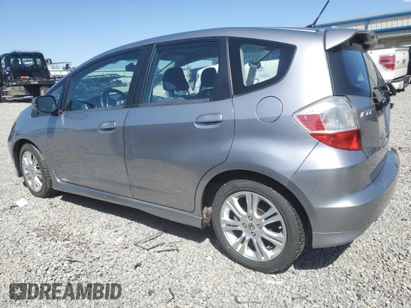 2009 Honda Fit Sport z VIN JHMGE88489S010278, wystawiony jako Copart lot #52251405 z przebiegiem 120 511 mil mil oraz Szkoda całkowita • Salvage title. Historia ofert i sprzedaży dostępna na DreamBid. Obrazek 2.