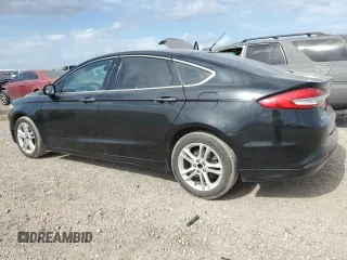 2018 Ford Fusion SE z VIN 3FA6P0HD8JR217719, wystawiony jako Copart lot #53429555 z przebiegiem 108 953 mil mil oraz Szkoda całkowita • Salvage title. Historia ofert i sprzedaży dostępna na DreamBid. Obrazek 2.