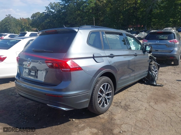 2021 Volkswagen Tiguan S with VIN 3VV1B7AX4MM074898, listed as a IAAI auction lot 40565377 with 1 mi miles. Bid and sale history available at carsss.com. Image 4.