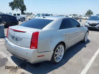 2008 Cadillac CTS RWD z VIN 1G6DV57V880153063, wystawiony jako IAAI lot #42440277 z przebiegiem 158 312 mil mil oraz . Historia ofert i sprzedaży dostępna na DreamBid. Obrazek 4.
