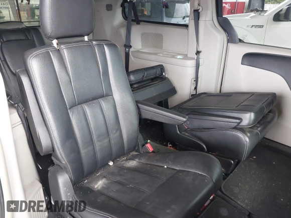 2014 Chrysler Town & Country Touring with VIN 2C4RC1BG8ER296073, listed as a IAAI auction lot 42164103 with 129,006 mi miles and . Bid and sale history available at DreamBid. Image 8.