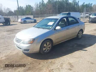 2009 Kia Spectra EX with VIN KNAFE221995647605, listed as a IAAI auction lot 41680420 with 169,000 mi miles. Bid and sale history available at carsss.com. Image 2.