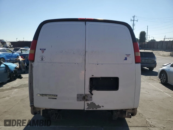 2012 Chevrolet Express Cargo Van with VIN 1GCWGGCA3C1150136, listed as a Copart auction lot 81989674 with 294,228 mi miles and Salvage Title. Bid and sale history available at carsss.com. Image 6.
