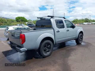 2007 Nissan Frontier LE with VIN 1N6AD07W17C438647, listed as a IAAI auction lot 40502289 with 153,553 mi miles and . Bid and sale history available at DreamBid. Image 4.